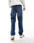 ASOS DESIGN straight leg jeans with carpenter detail in mid wash blue