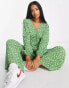 Glamorous Petite v-neck button front jumpsuit in green mini daisy print