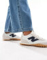 New Balance RC30 trainers with gum sole in white and navy