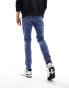 Фото #2 товара ASOS DESIGN skinny jeans in mid wash blue