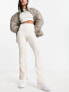 Фото #4 товара adidas Originals 'ski chic' flared rib leggings in oatmeal