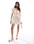 Фото #1 товара ASOS DESIGN corset waist milkmaid playsuit in white and pink floral