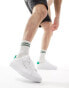 Tommy Hilfiger leather court trainers in white and green