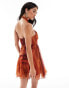 Фото #3 товара ASOS DESIGN cross front halter gathered mini dress with side split in orange abstract print