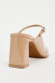 Patent finish slingback shoes with strap