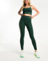 Hummel stretch legging with side panel in dark green