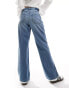 Фото #2 товара Hollister ultra high rise baggy fit jeans in mid blue