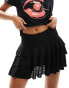 Фото #1 товара Reclaimed Vintage mini tiered ruffle skort in black