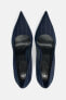 Pinstripe high-heel shoes