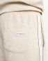 Фото #2 товара Tommy Hilfiger velour logo jogger in beige