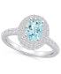 ფოტო #1 პროდუქტის Aquamarine and Diamond Halo Ring