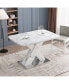 White marble dining table with X-shaped metal legs