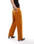 ASOS DESIGN wide leg smart trousers in burnt orange with front pockets