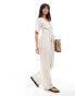 Фото #3 товара Vero Moda Aware short sleeved jumpsuit with tie waist in cream