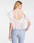 ASOS DESIGN Going Out corset top with organza ruffle sleeve & hem in lilac