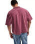 ASOS DESIGN oversized heavyweight polo in washed burgundy