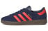 Фото #1 товара adidas originals Munchen 潮流休闲 防滑耐磨 低帮 板鞋 蓝棕橙 / Кроссовки Adidas originals Munchen GY7400