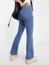 Topshop Petite high rise Jamie flare jeans in mid blue