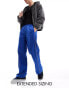 Фото #1 товара ASOS DESIGN baggy nylon track pants in blue with white piping