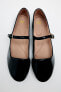 Faux patent ballet flats with ankle strap