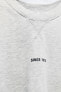 Cropped slogan sweatshirt