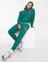 Фото #4 товара Karl Kani retro patch joggers in green