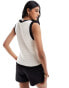 ASOS DESIGN textured tie front waistcoat with contrast tipping in cream and black