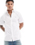 Фото #1 товара Tommy Hilfiger 1985 flex oxford regular fit short sleeve shirt in white