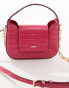 DKNY Arden top handle bag with cross body strap in pink croc