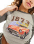 Urban Revivo long sleeve raglan cropped t-shirt with ruched sides and car graphic in taupe