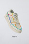 Minimalist lace-up sneakers with multicoloured trim