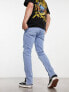 ASOS DESIGN skinny jeans with knee rips and zip detail in light blue