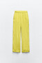 Creased-effect palazzo trousers