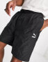 Puma logo quilted shorts in black exclusive to ASOS