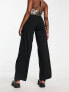 Neon & Nylon low waisted trousers with cut out detail in black