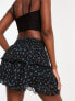 Фото #5 товара Stradivarius STR lace up ruffle mini skirt in grunge floral print