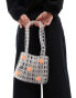 Glamorous beaded handbag with oranges in clear