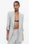 Open blazer with roll-up sleeve detail