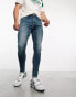 ASOS DESIGN power stretch jeans in light wash blue