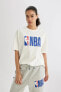 Фото #1 товара DeFactoFit NBA Wordmark Oversize Fit Bisiklet Yaka Baskılı Kısa Kollu Tişört T5506AZ24SM