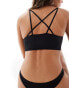 Фото #2 товара ASOS DESIGN seamless ribbed cross back bralette in black