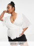 ASOS DESIGN Curve dobby wrap short sleeve blouse with pleated peplum hem in ivory