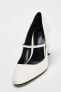 CURVED-HEEL SHOES