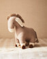 Children’s donkey soft toy with wheels