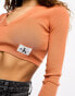 Фото #4 товара Calvin Klein Jeans label tight crop v-neck sweater in burnt clay