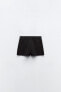 Box pleat skort