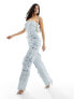 Simmi – Trägerloser Jeans-Jumpsuit in Blau mit weitem Bein