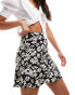 Wednesday's Girl flippy mini skirt in black daisy