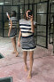 Фото #1 товара Короткая юбка с перфорацией ZARA