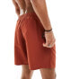 ASOS DESIGN swim shorts in mid length in rust